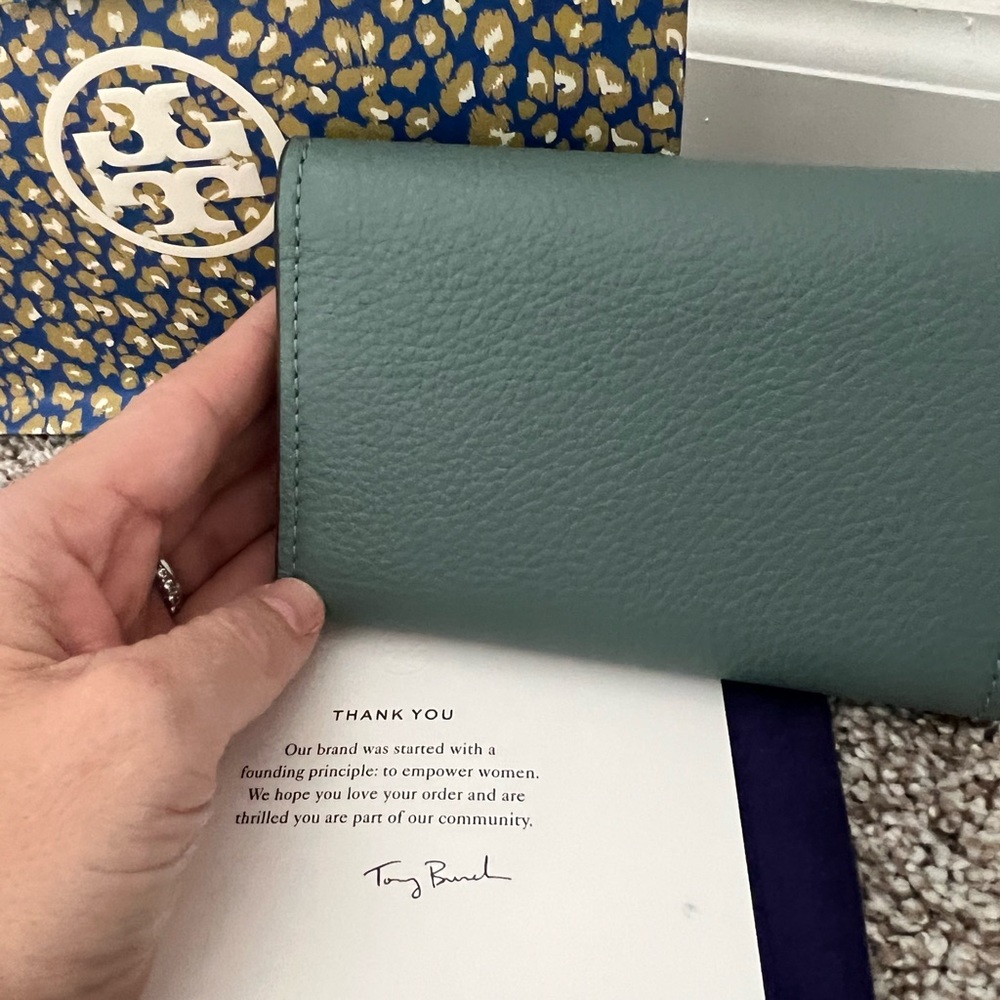 Brand new never used Tory Burch limited edition color block tri fold wallet.
